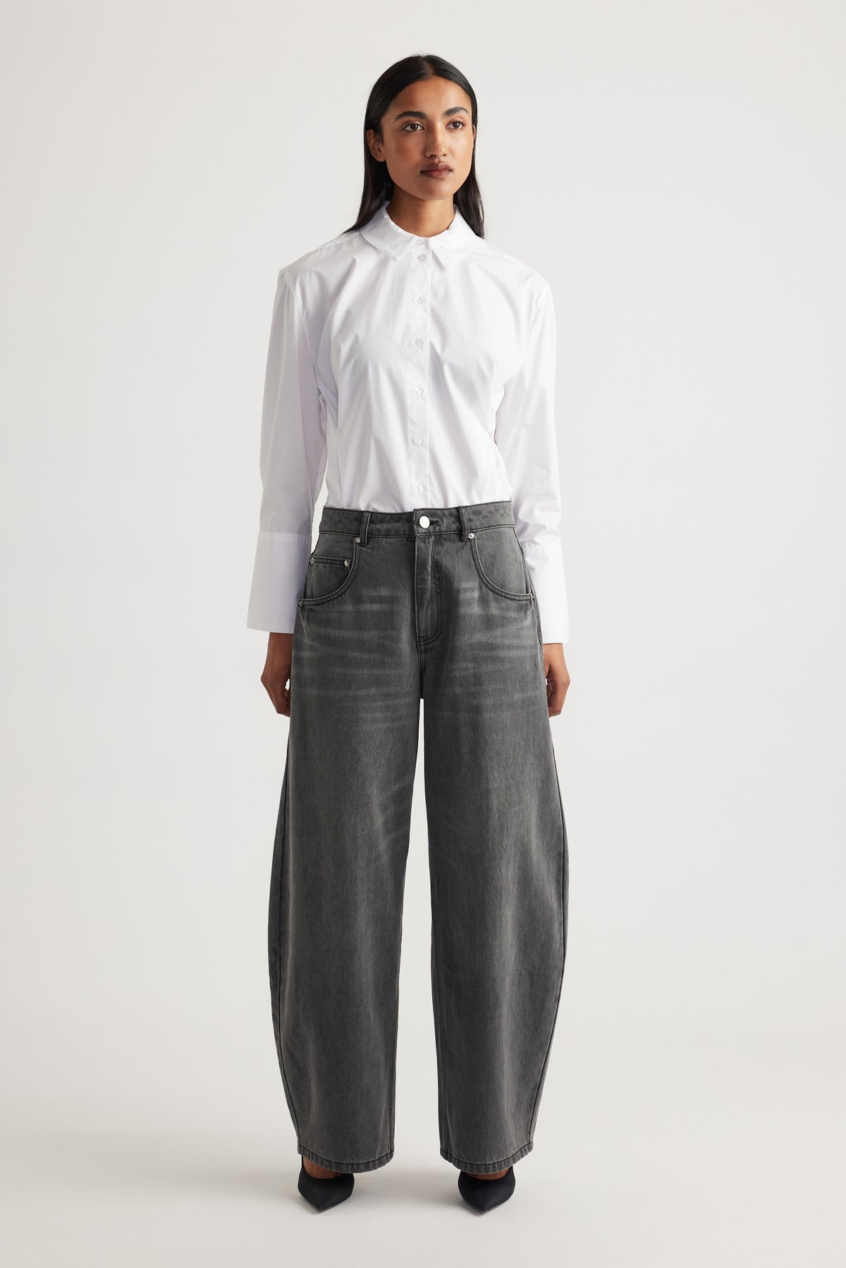 Daisy Horseshoe Jean in faded black denim with a high rise and wide leg from DECJUBA Australian fashion brand