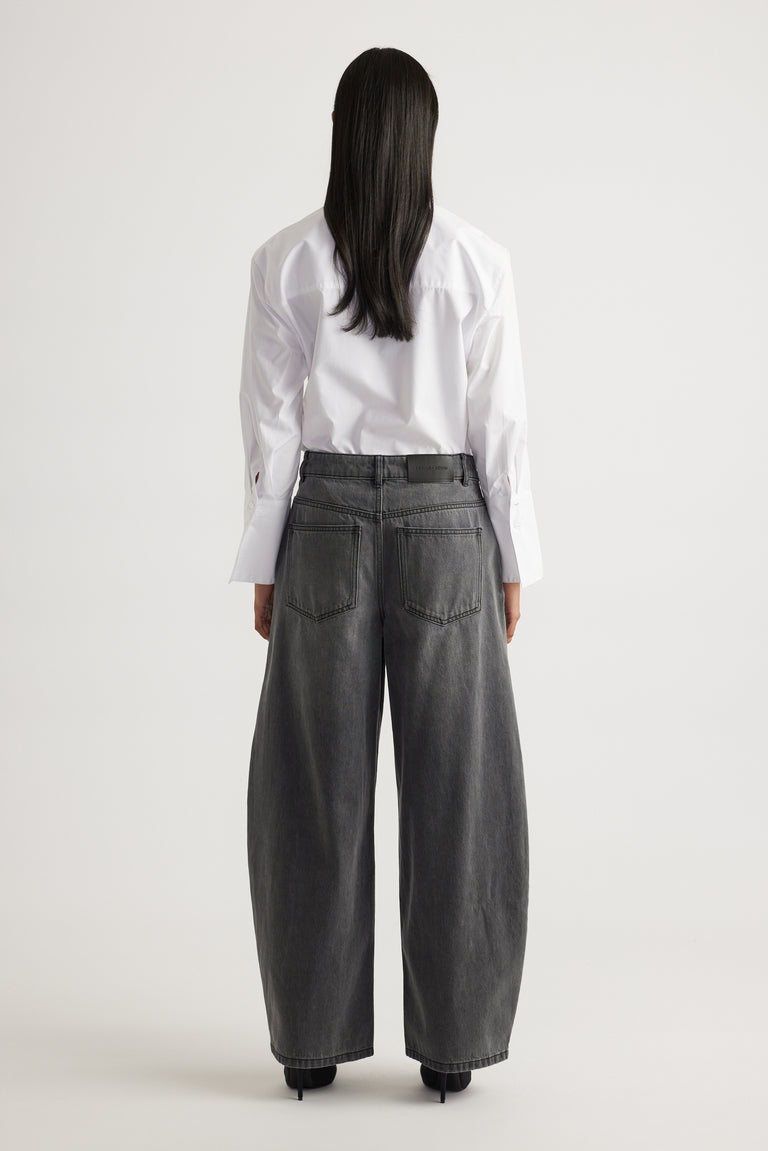 Daisy Horseshoe Jean in faded black denim with a high waist and relaxed wide leg by DECJUBA Australian fashion brand