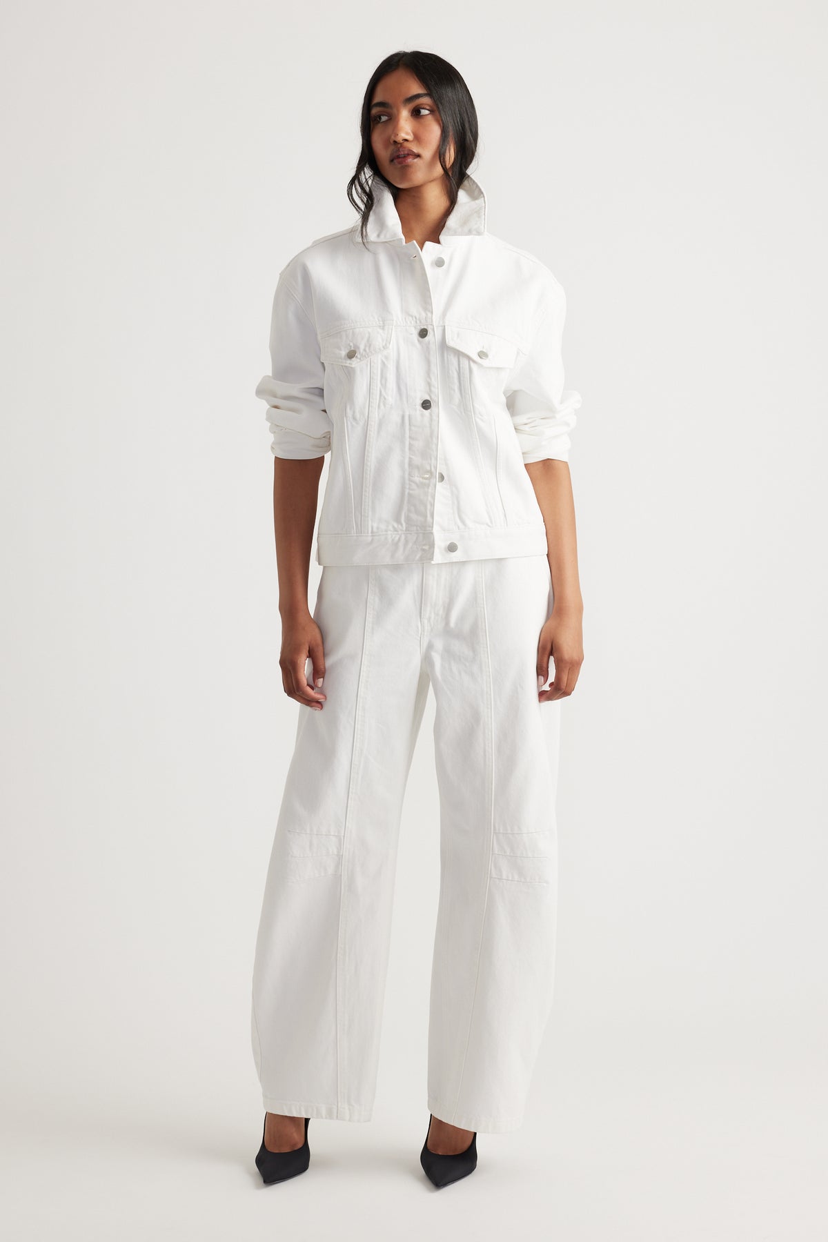 Nakita Denim Jacket in fresh white with structured collar and relaxed fit, paired with wide leg pants by DECJUBA Australian fashion brand