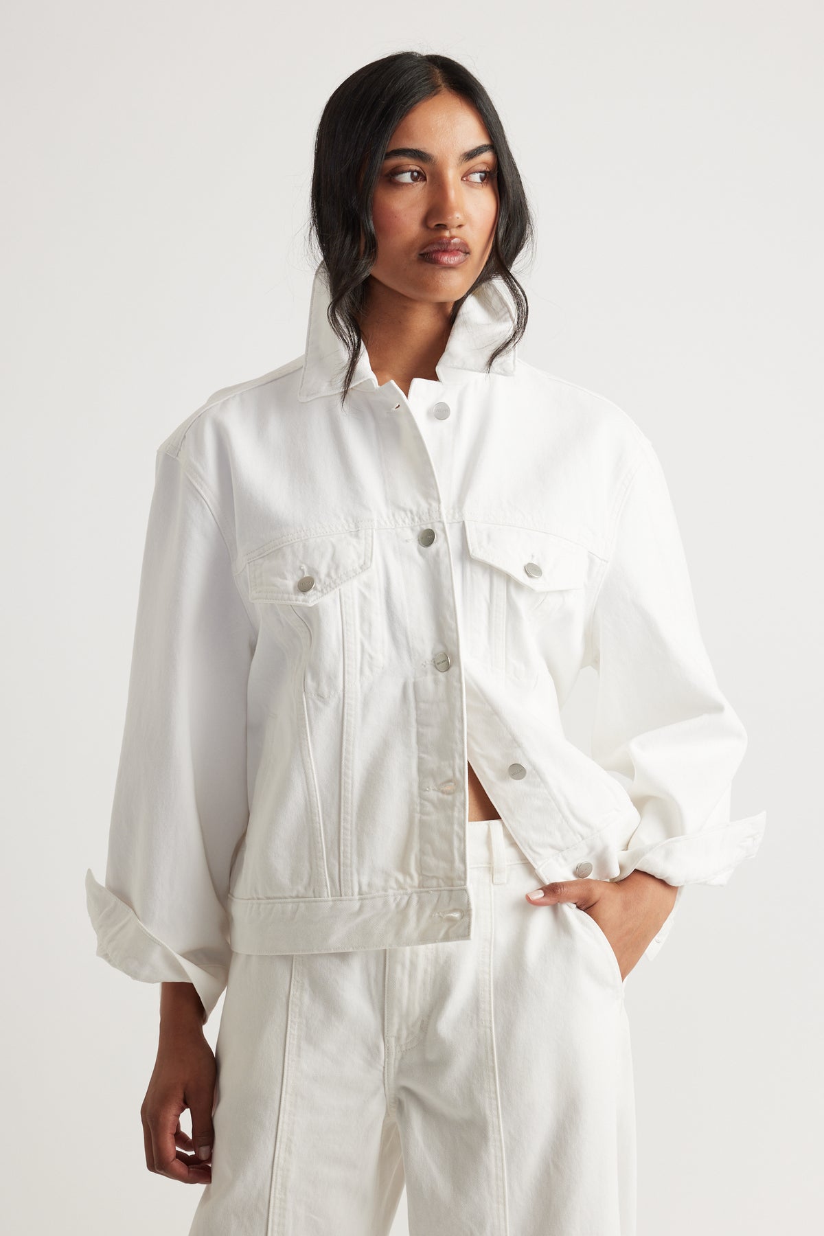 Nakita Denim Jacket in crisp white denim with relaxed fit and button front by DECJUBA Australian fashion brand