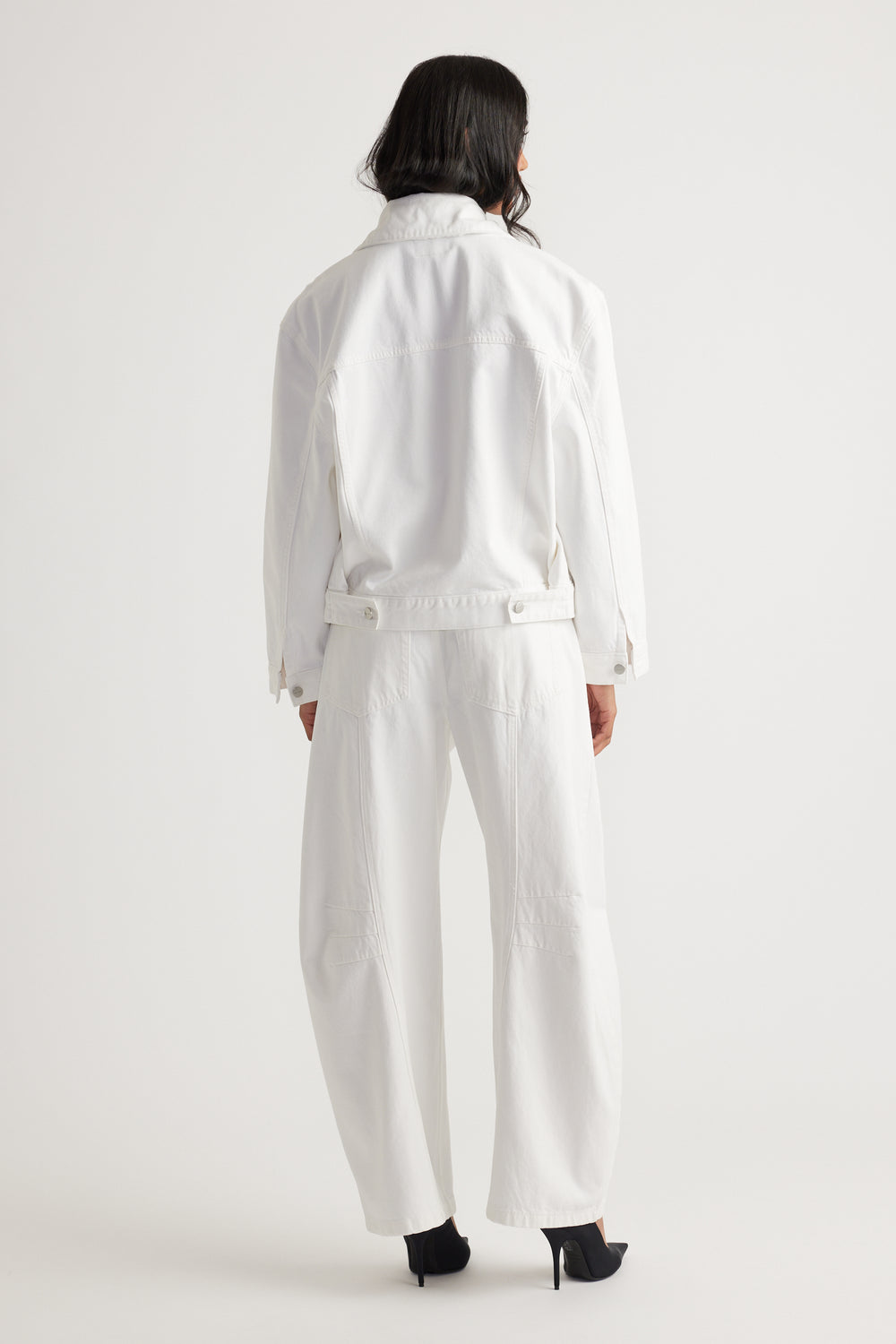 Nakita Denim Jacket in crisp white with relaxed silhouette and button details by DECJUBA Australian fashion brand