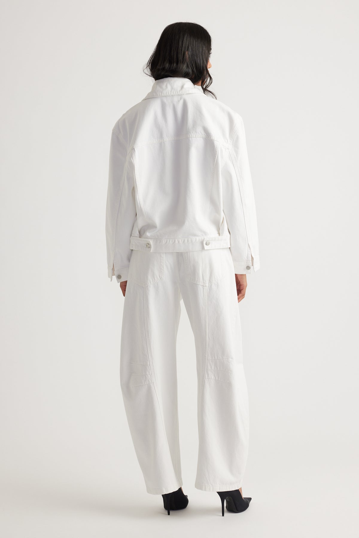 Nakita Denim Jacket in crisp white with relaxed silhouette and button details by DECJUBA Australian fashion brand