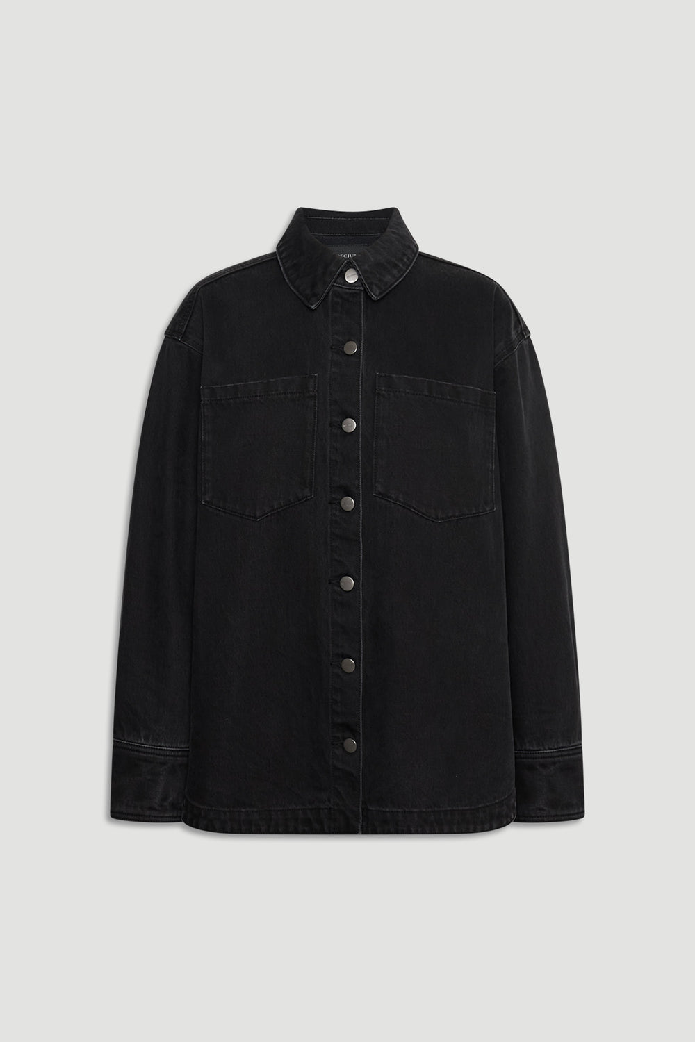 Black denim shirt with front button closure, chest pockets, and classic collar for timeless casual style