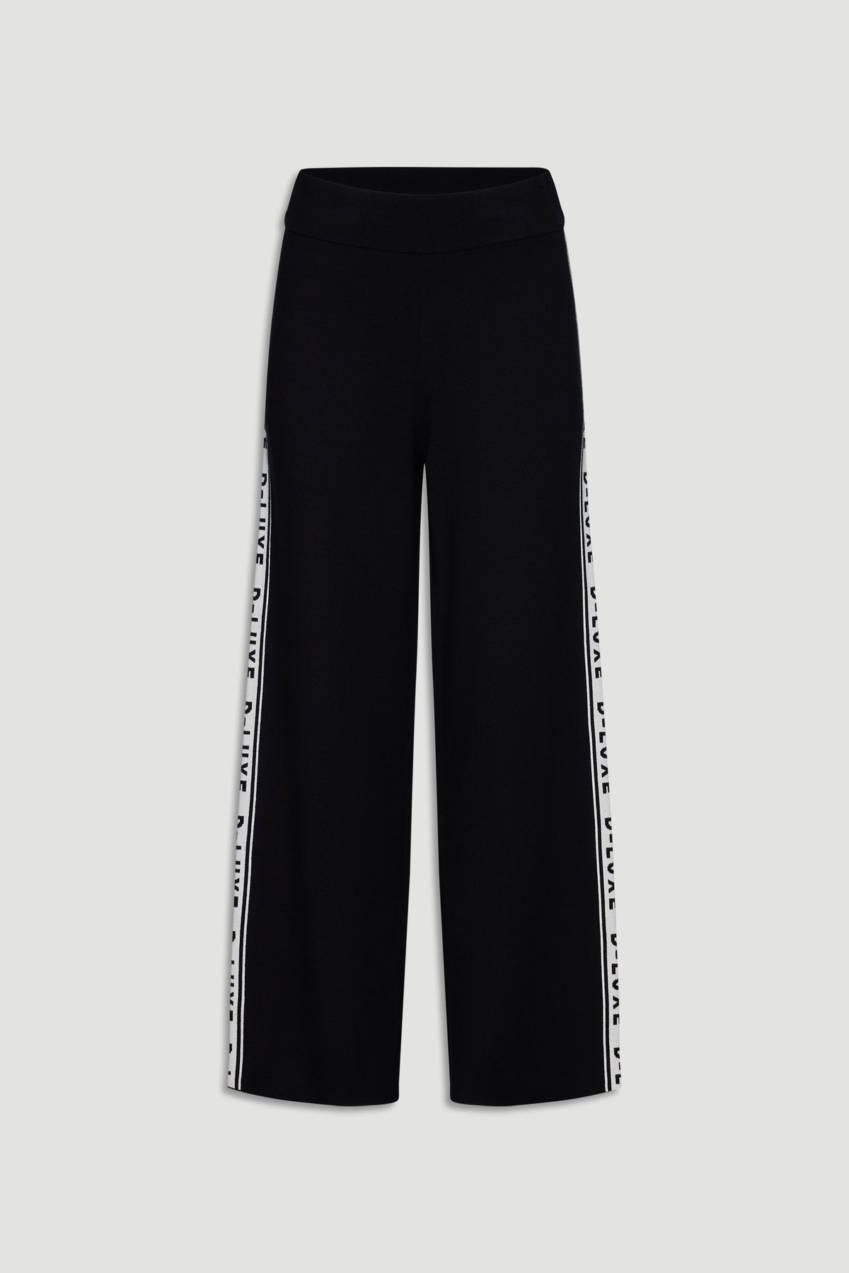 Black wide-leg knit pants featuring contrast logo panels along the side seams for a sporty, modern look.