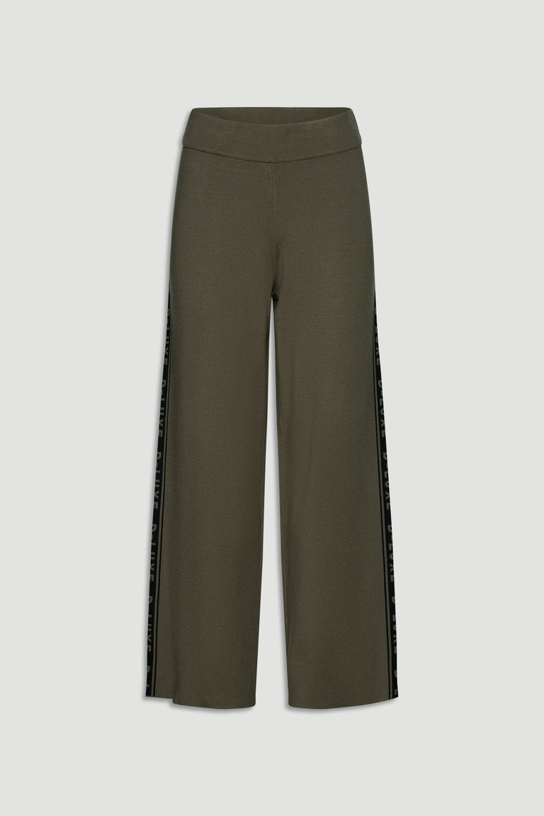 Olive green wide-leg knit pants with a high waistband and black logo panels running down the sides