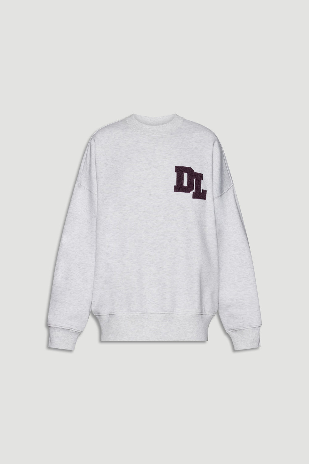 Light grey crew sweat with dropped shoulders and a textured dark logo patch on the chest for a casual look