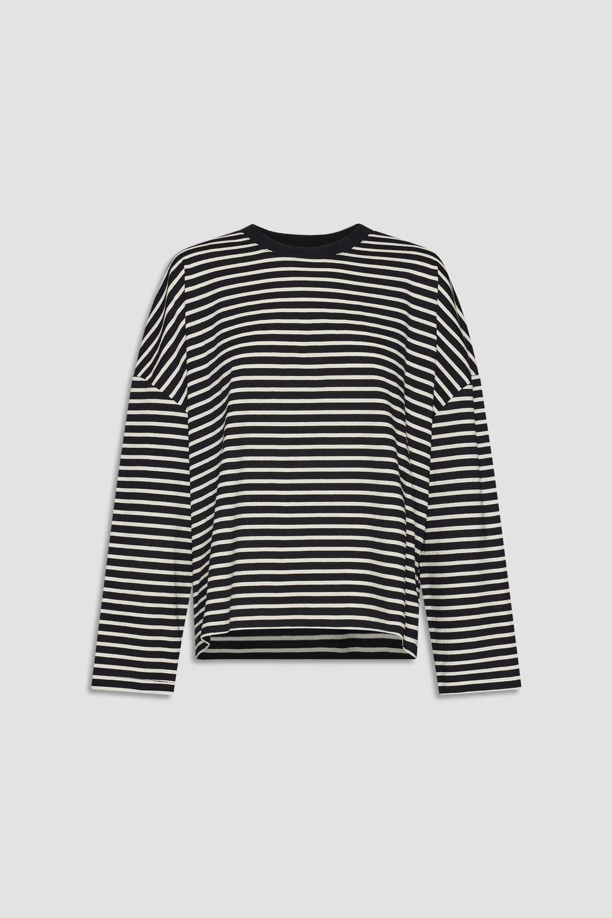 Black and ivory striped long sleeve top with a relaxed fit, perfect for versatile everyday styling