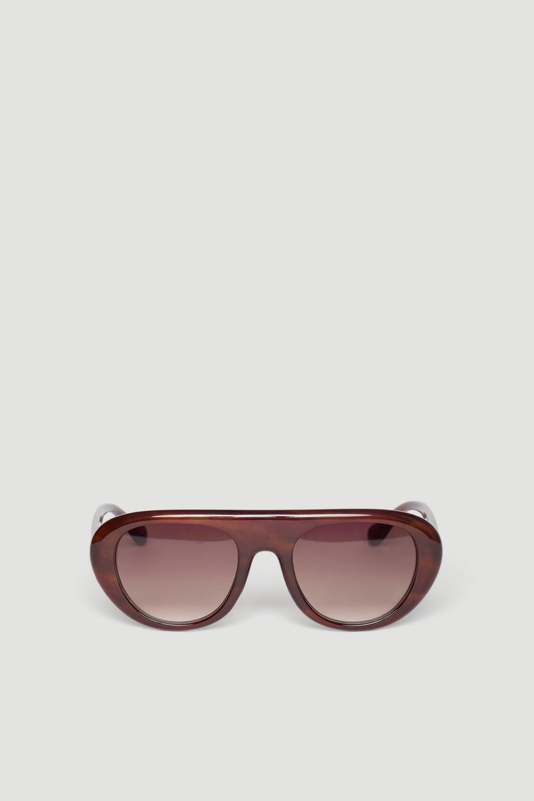 Brown retro aviator sunglasses with rounded gradient lenses and a glossy frame for a stylish vintage look