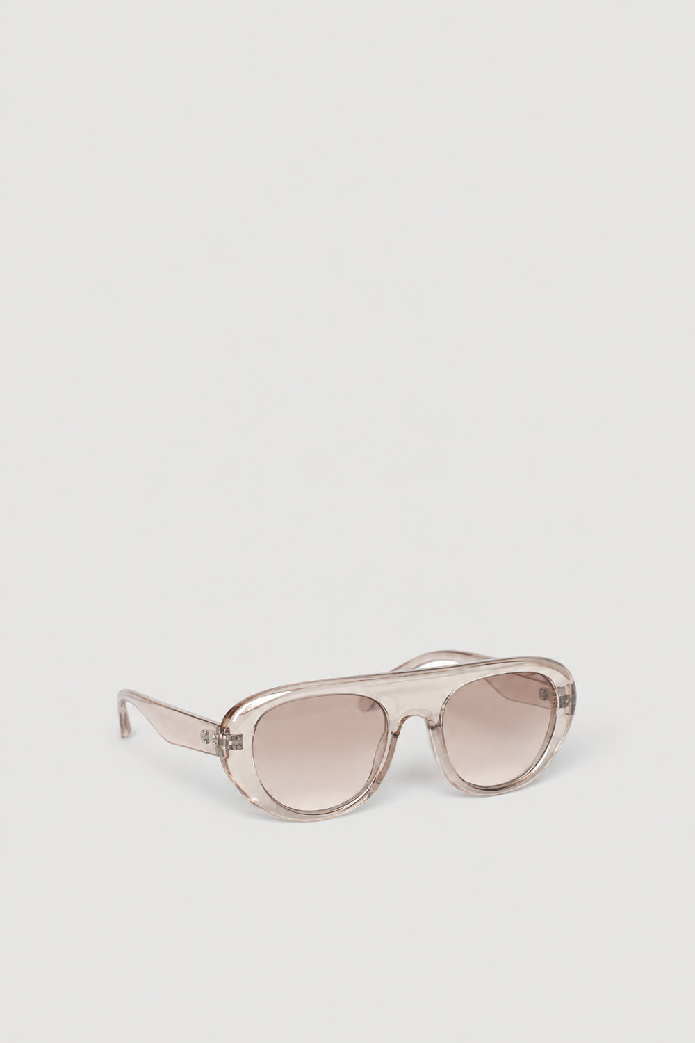 Oversized rose gold aviator sunglasses with softly tinted lenses and full UV protection