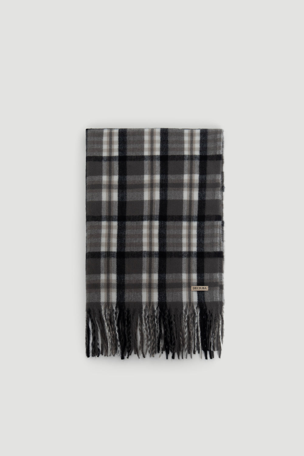 Folded grey and black checked scarf with soft texture and fringed edges on a light background