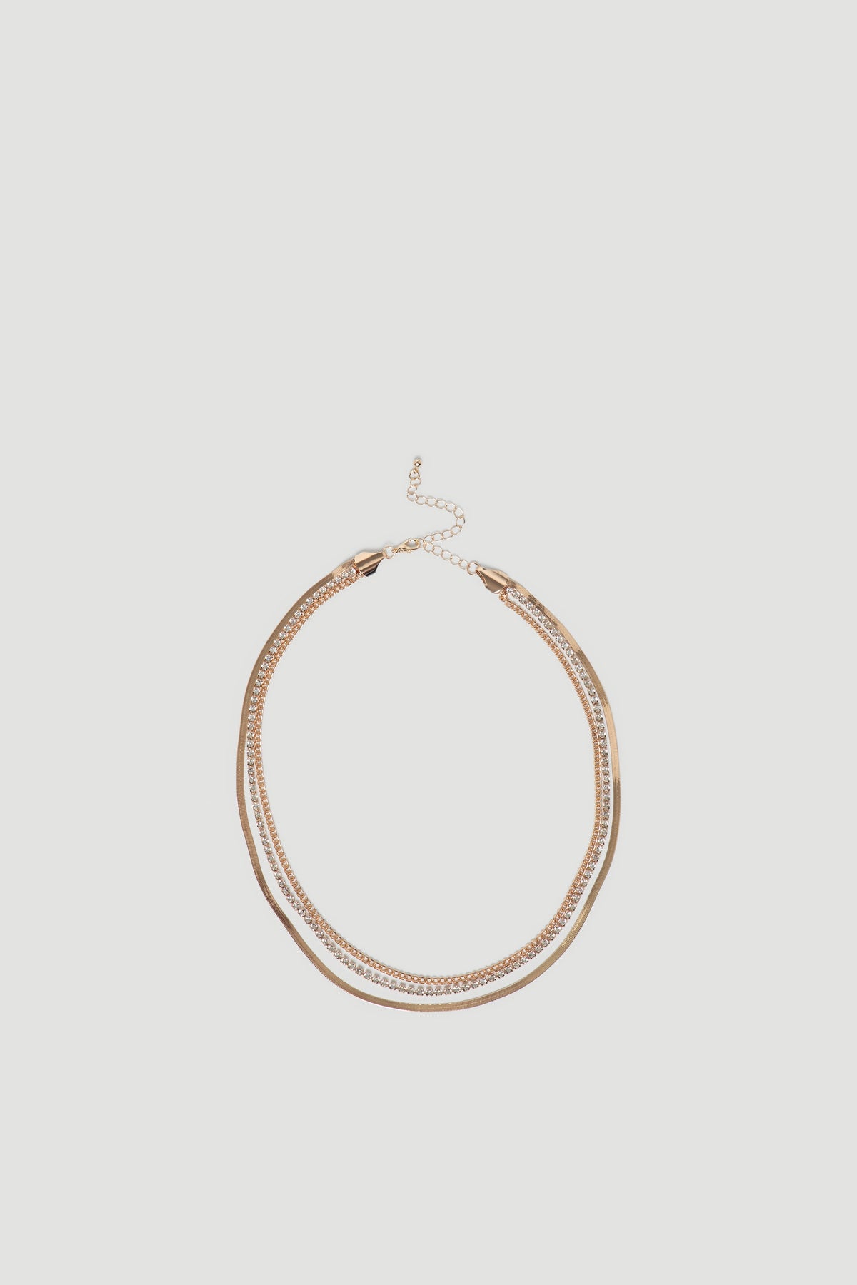 Delicate gold-tone Callie Layered Necklace featuring multiple chains for an elegant, versatile accessory by DECJUBA.