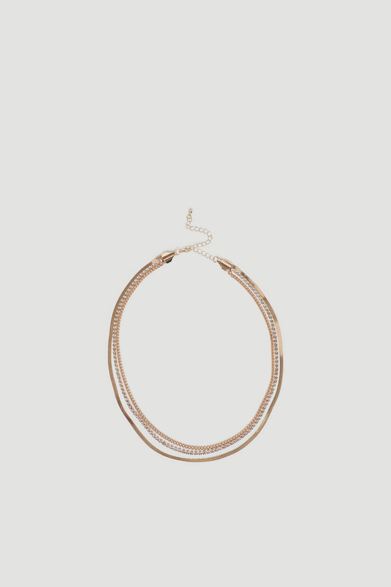 Delicate gold-tone Callie Layered Necklace featuring multiple chains for an elegant, versatile accessory by DECJUBA.