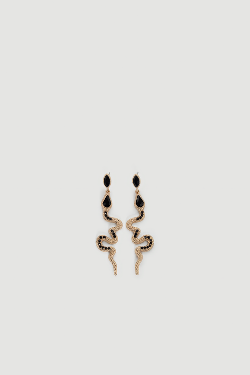 Gold-tone snake-shaped drop earrings with black gemstone accents and textured detailing on light background