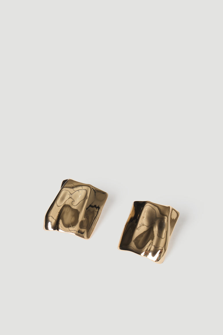 Pair of glossy gold-toned rectangular stud earrings with a slightly irregular, sculpted surface for a modern look