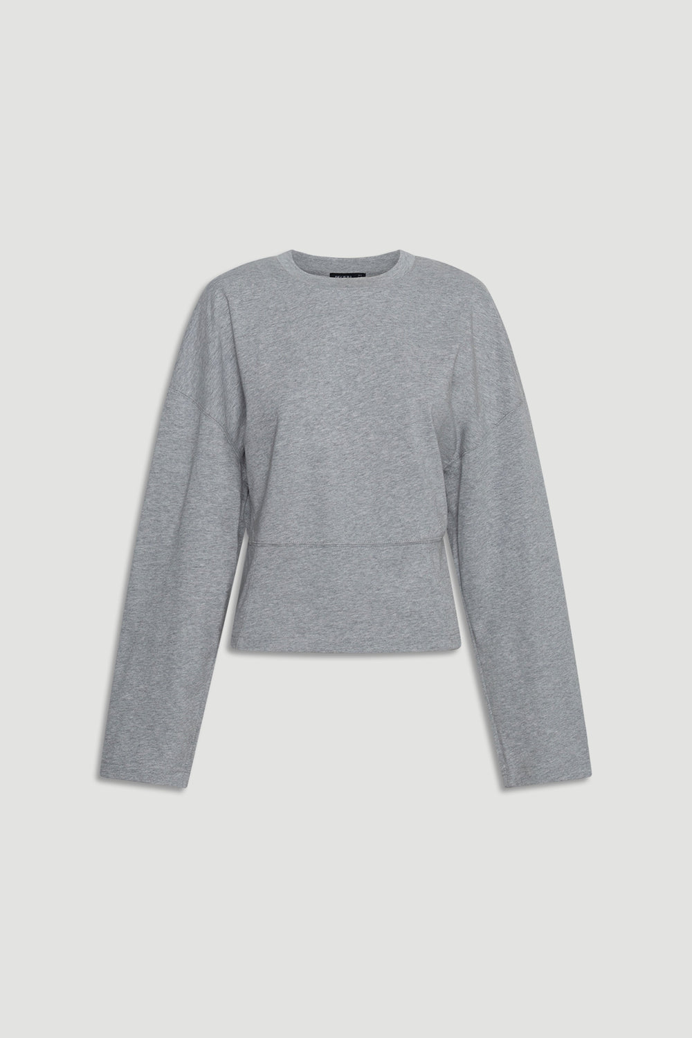 Soft grey long sleeve top with subtle seam detailing and a relaxed, slightly cropped fit for everyday wear