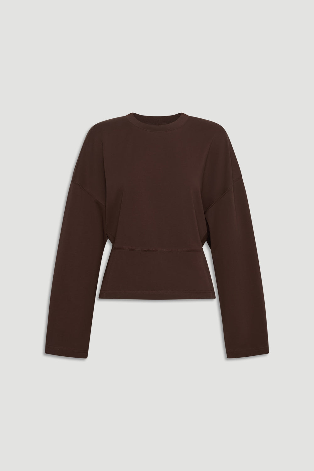 Dark brown long sleeve top with a relaxed fit and cinched waist for a modern, flattering silhouette