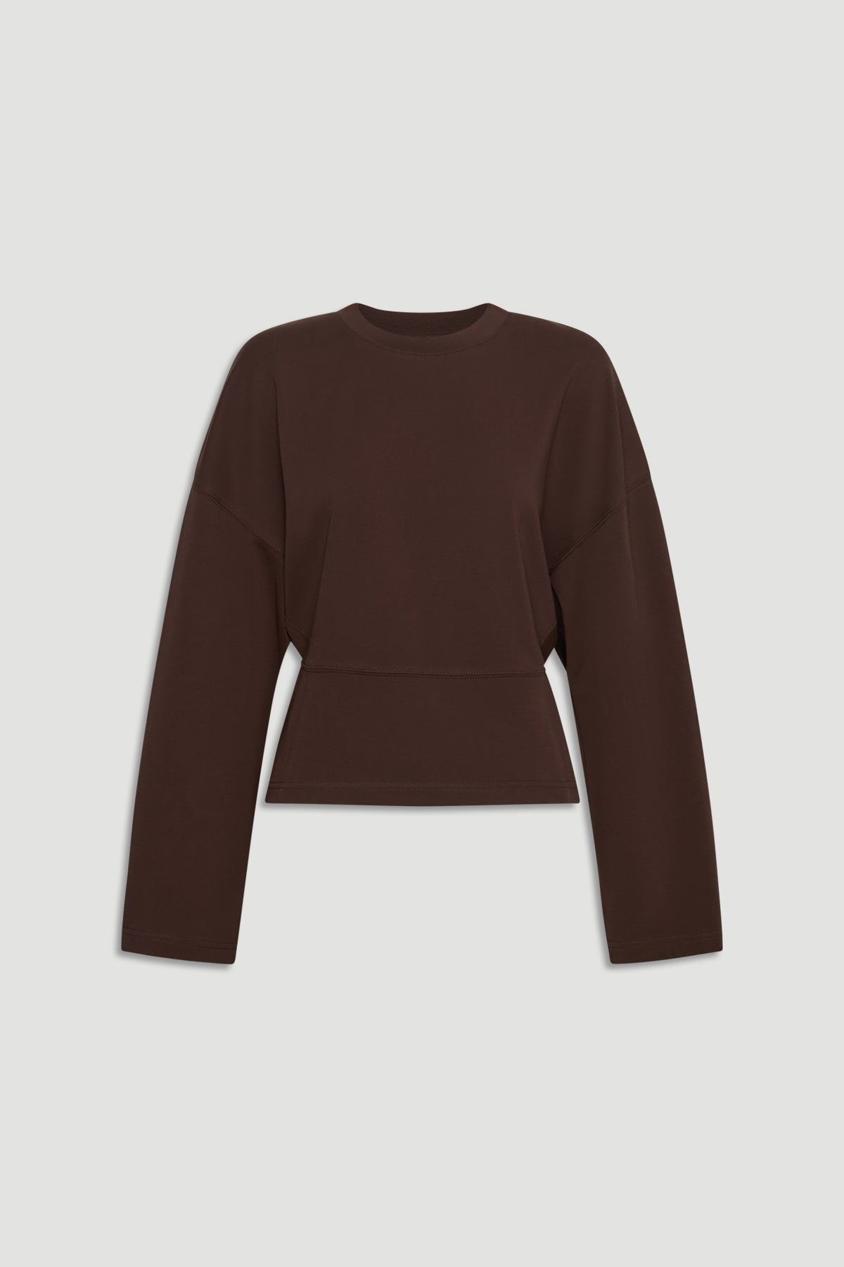 Dark brown long sleeve top with a relaxed fit and cinched waist for a modern, flattering silhouette