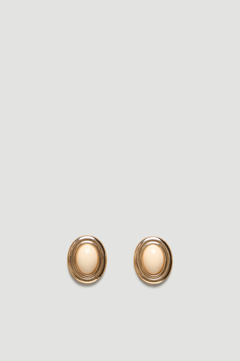 Oval gold-tone stud earrings featuring a smooth cream center for a timeless, elegant accessory look.