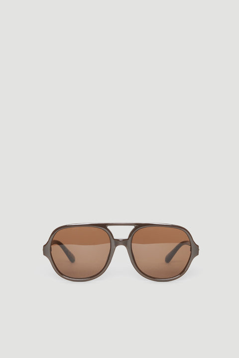 Oversized aviator sunglasses with brown tinted lenses and a matte brown frame offering full UV protection