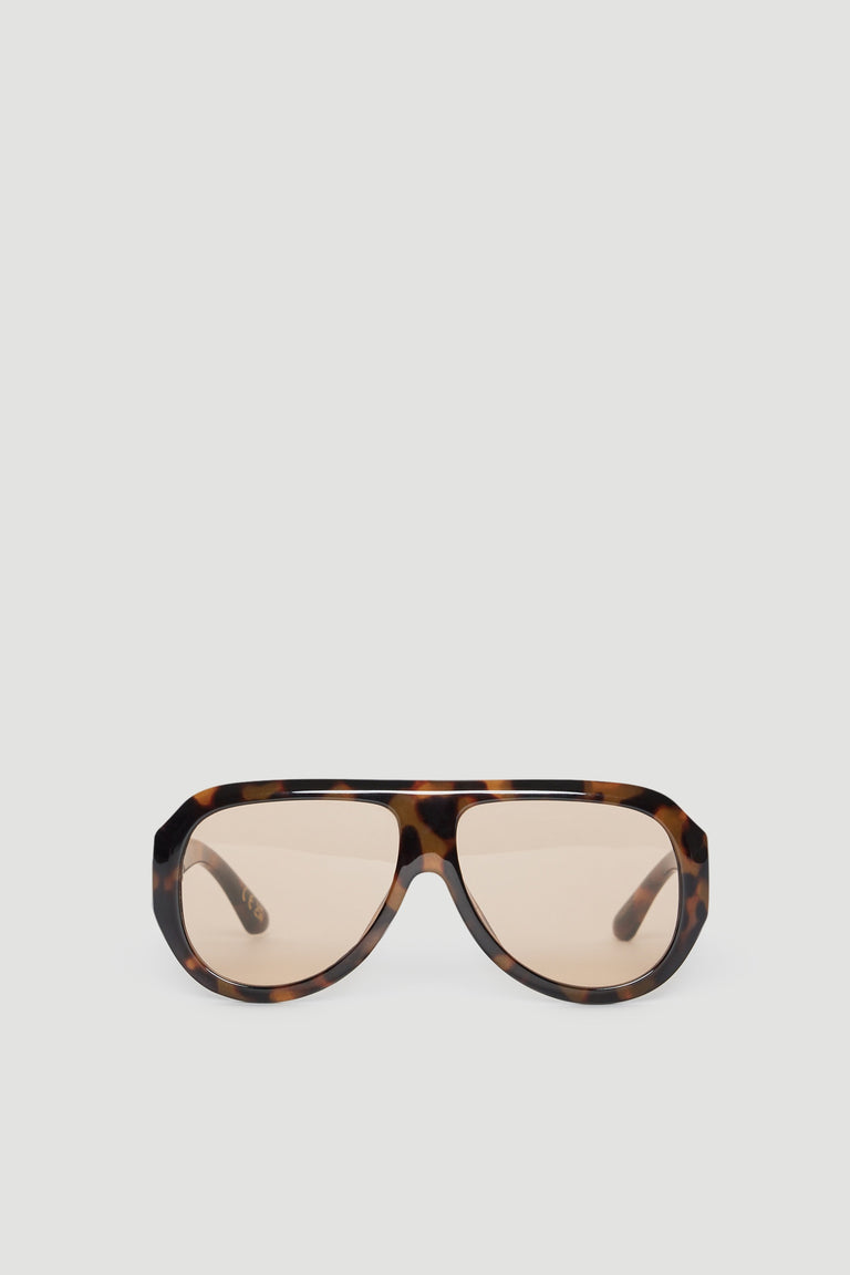 Oversized aviator sunglasses with a tortoiseshell frame and tinted lenses offering full UV protection
