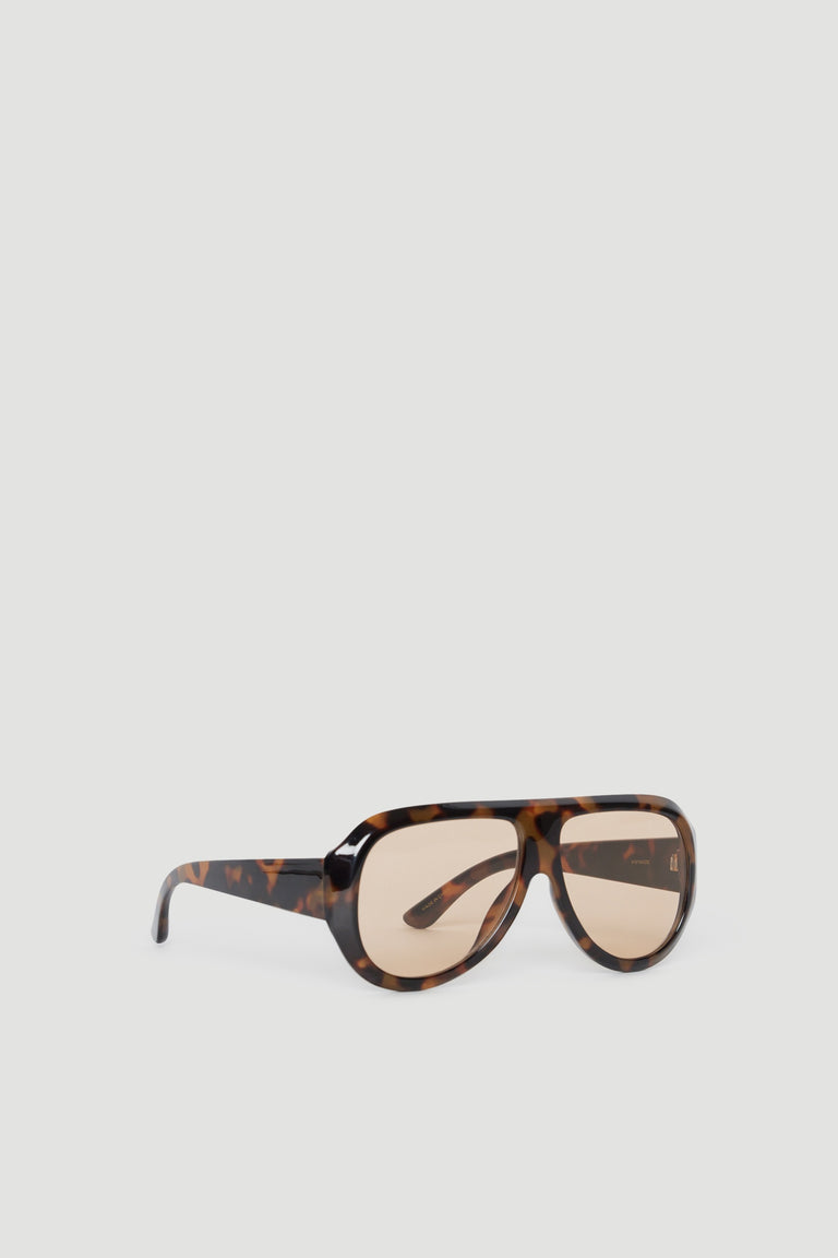 Oversized aviator sunglasses with tortoiseshell frame and tinted lenses offering full UV protection