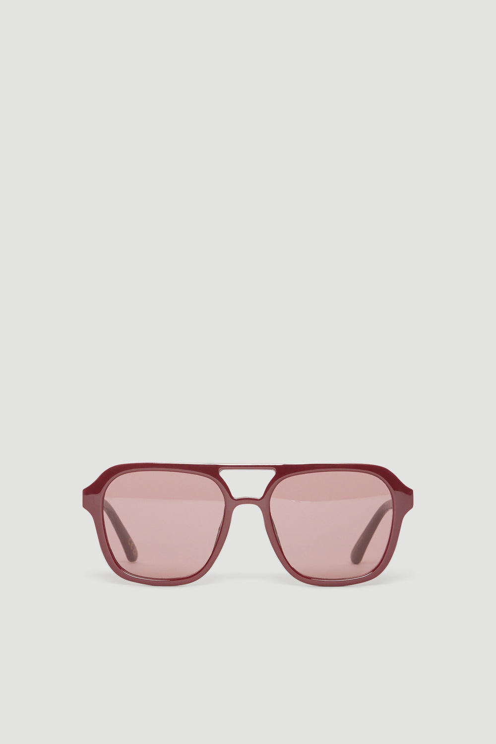 Plum aviator sunglasses with tinted pink lenses and matching frames