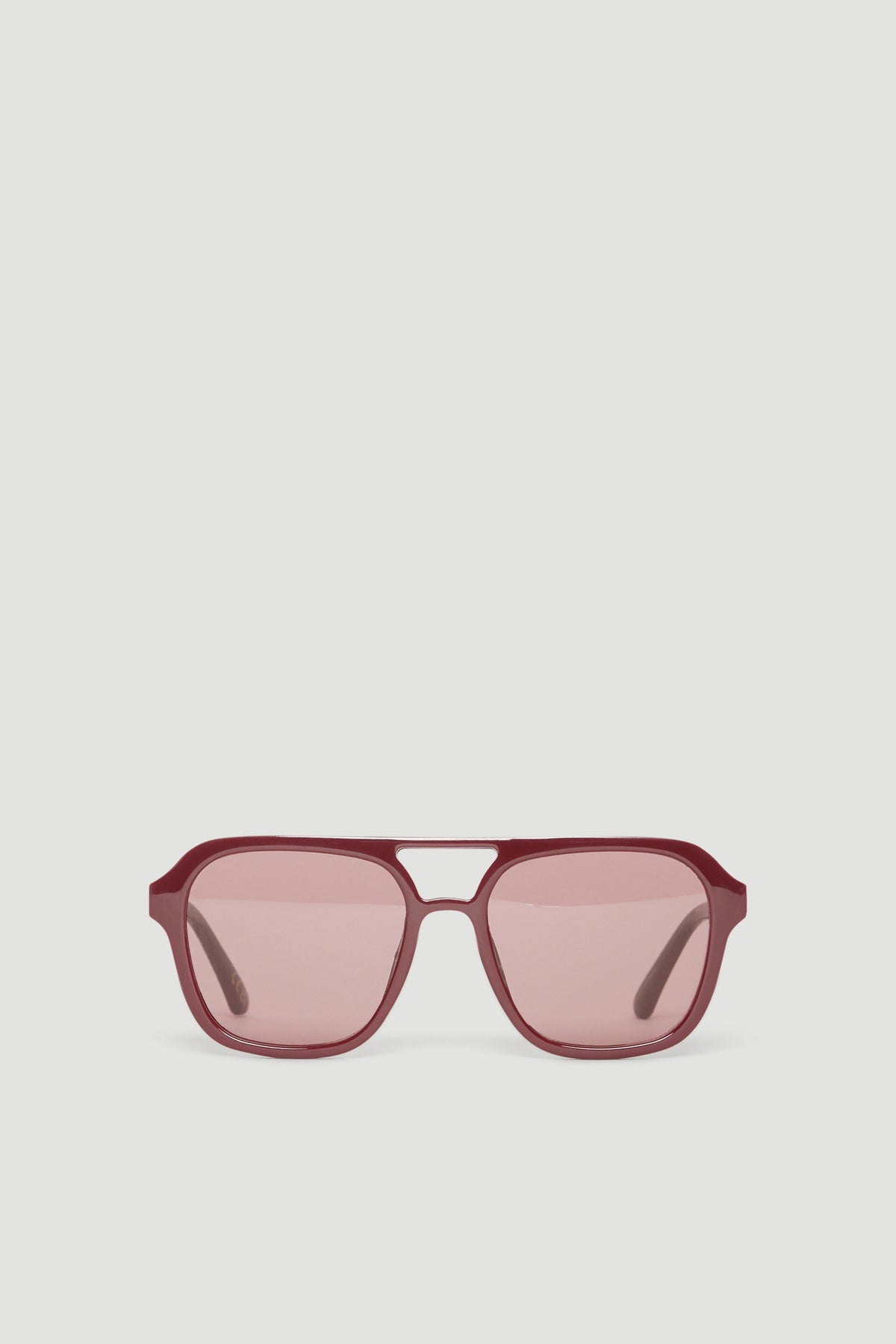 Plum aviator sunglasses with tinted pink lenses and matching frames