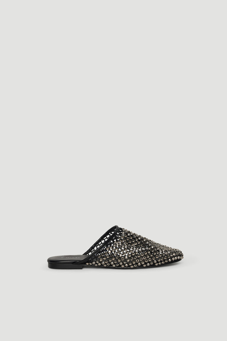 Black slip-on mule embellished with sparkling diamante studs and a sleek pointed toe for a refined statement look
