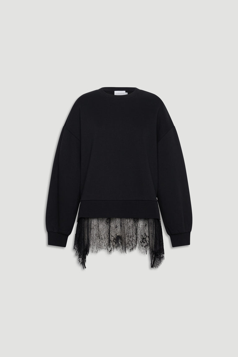 Black relaxed sweatshirt featuring delicate lace hem detailing for a stylish, effortless layering look.