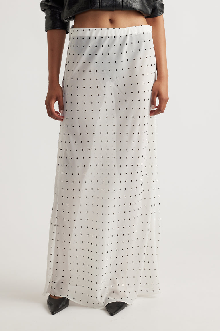 Faye Sheer Maxi Skirt second gallery image showing white sheer fabric with black polka dots and elastic waistband