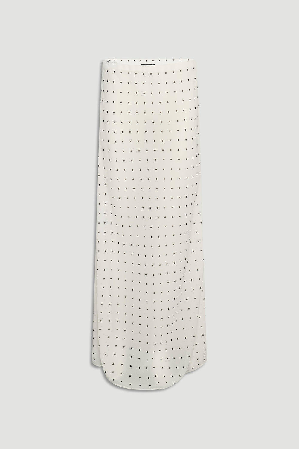 Faye Sheer Maxi Skirt in ivory with delicate black polka dots, featuring a lightweight, flowing silhouette by DECJUBA.