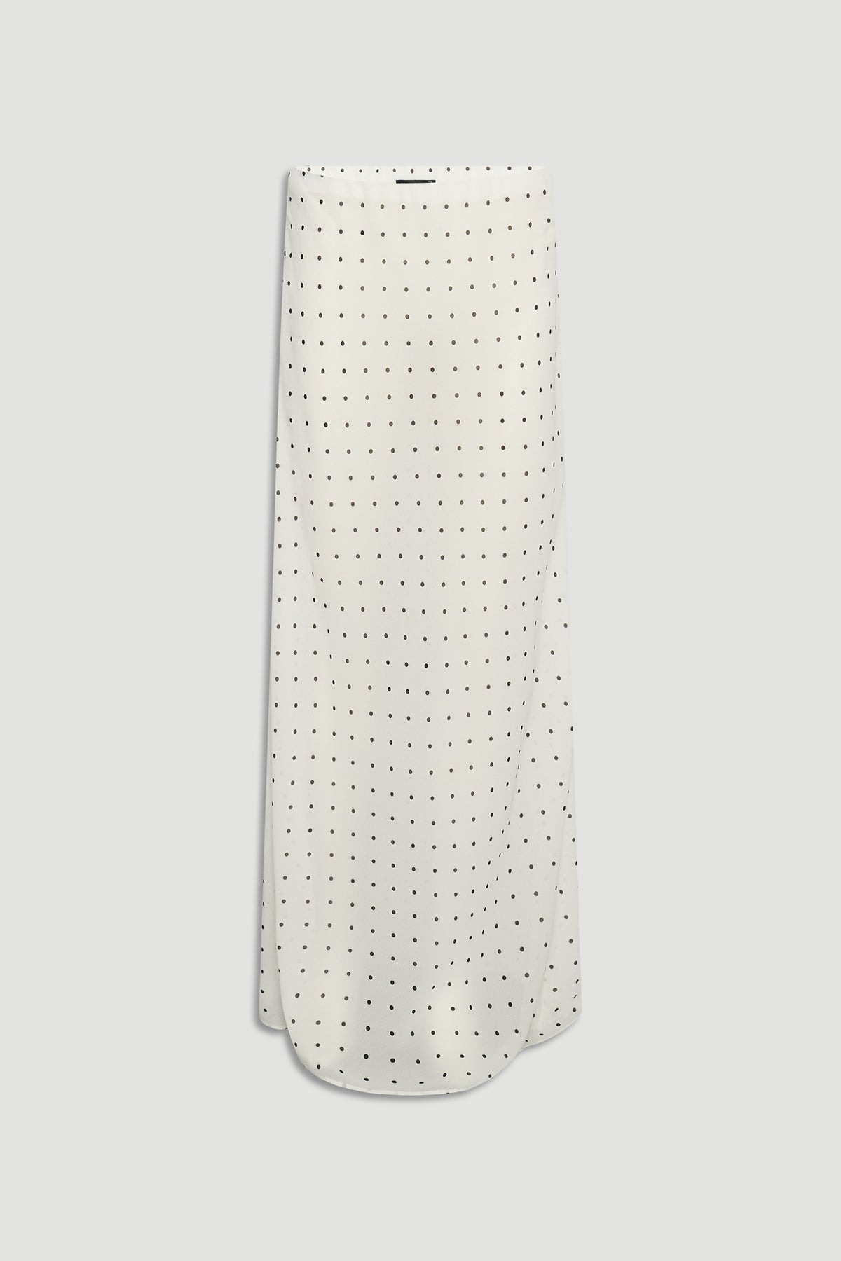 Faye Sheer Maxi Skirt in ivory with delicate black polka dots, featuring a lightweight, flowing silhouette by DECJUBA.