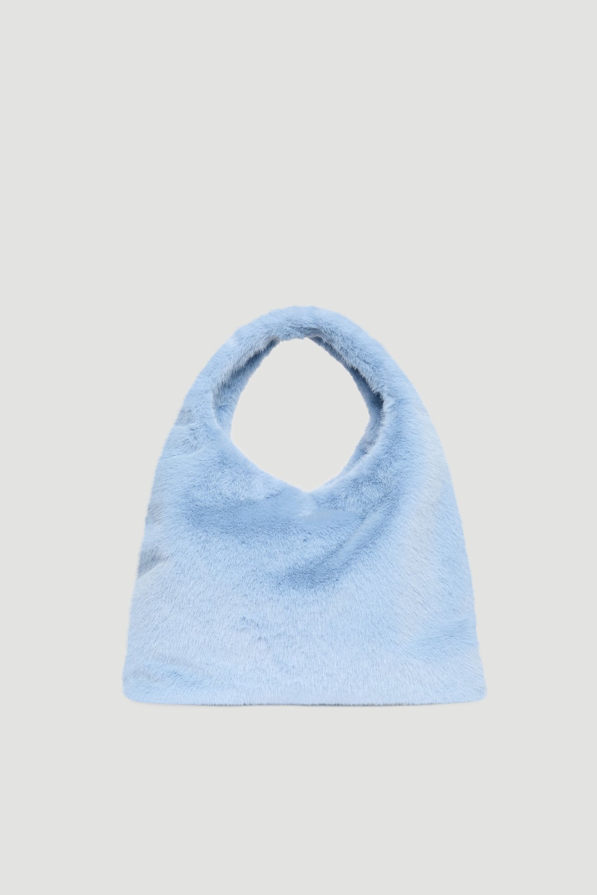 Soft sky blue fluffy tote bag with rounded handles offering a cozy, stylish, and versatile everyday accessory.