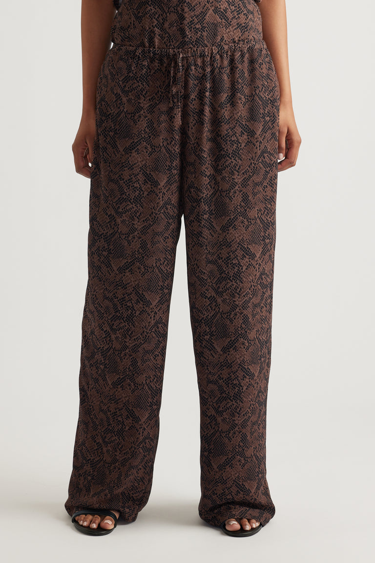 Relaxed fit wide-leg pants in a muted snake print, crafted for effortless everyday style and comfort