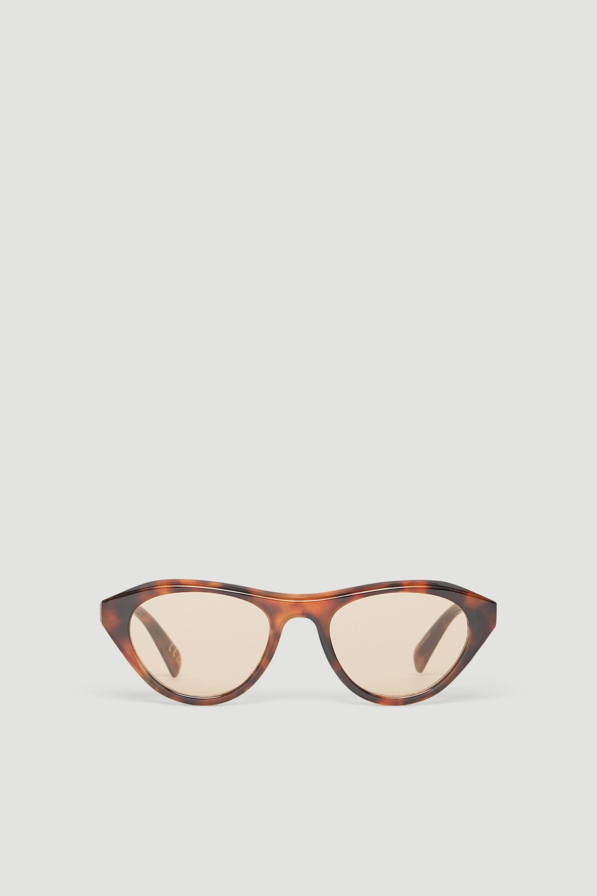 Tortoiseshell cat eye sunglasses with brown lenses and matching arms