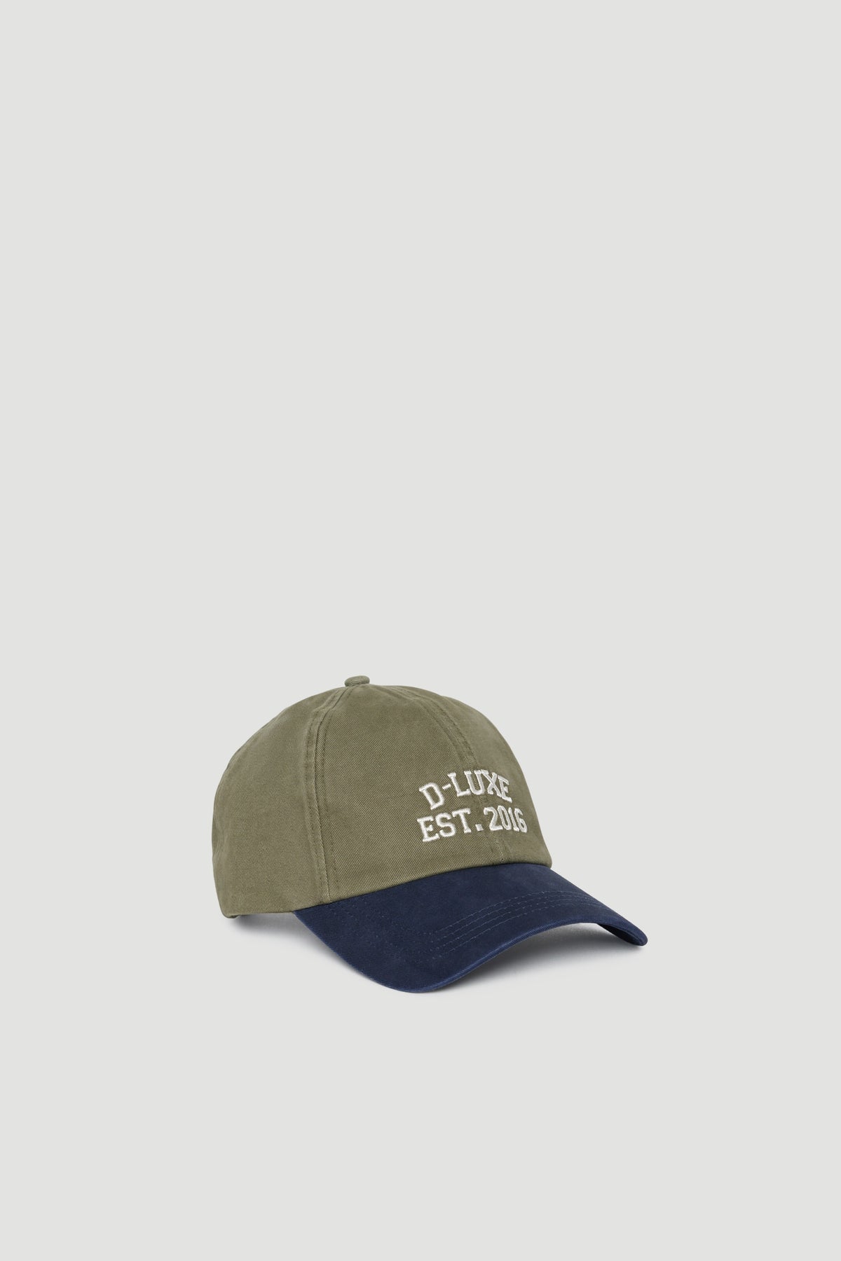 Baseball cap with embroidered logo in olive green crown and navy curved brim featuring adjustable back strap