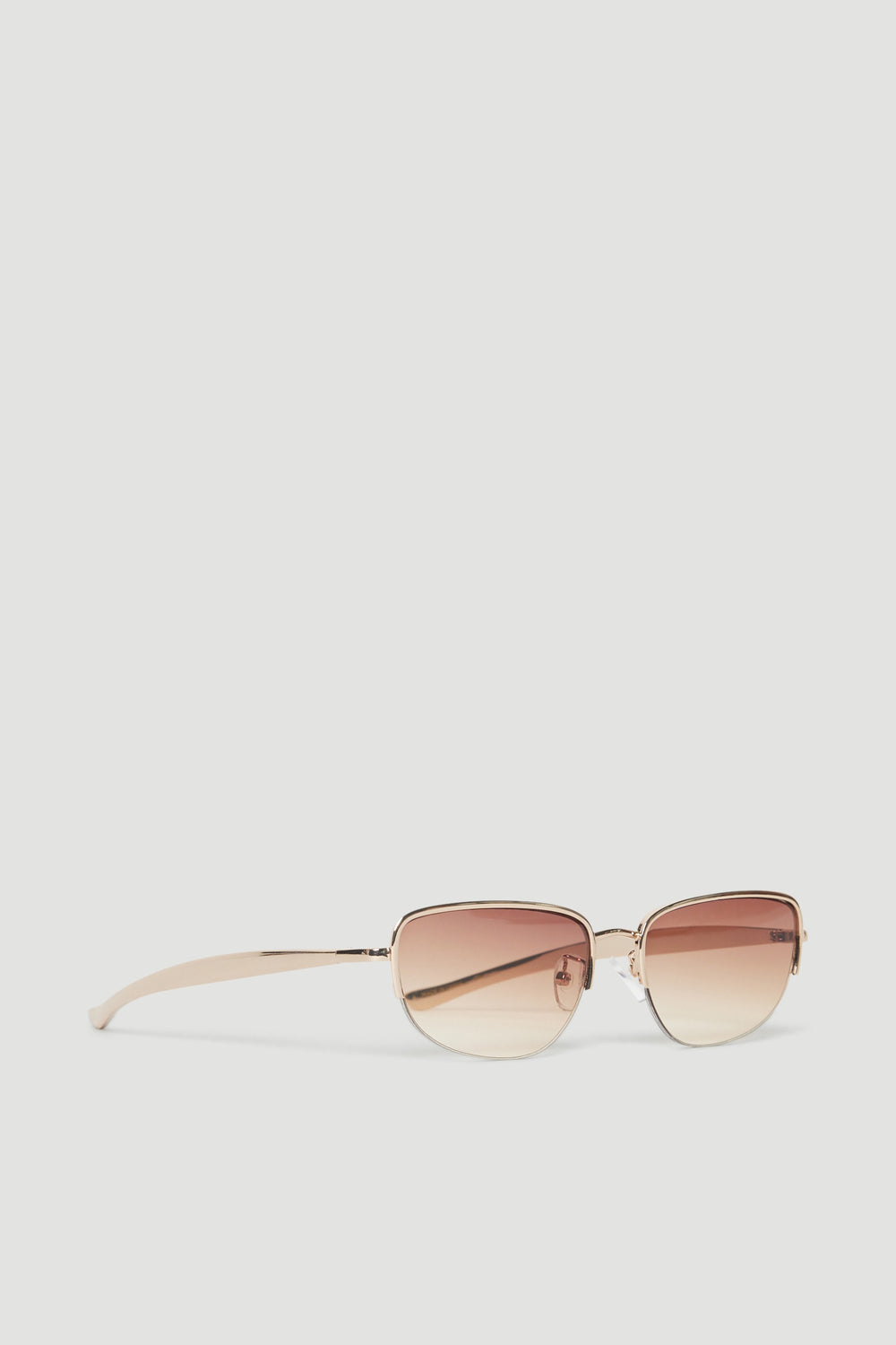 Gold metal cat eye sunglasses with rose ombre lenses