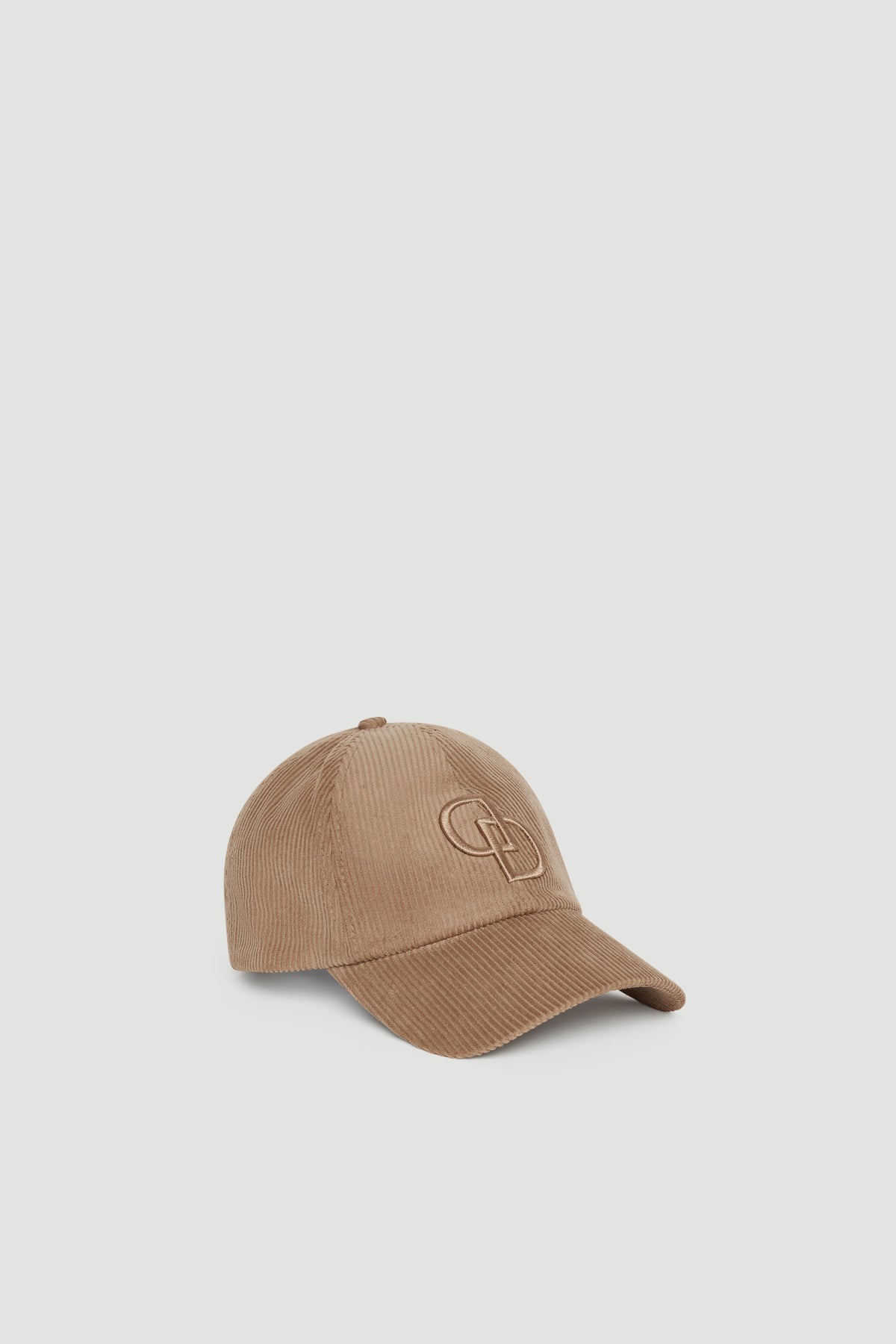 Light brown corduroy baseball cap with subtle embroidered logo detailing for a casual, stylish finish