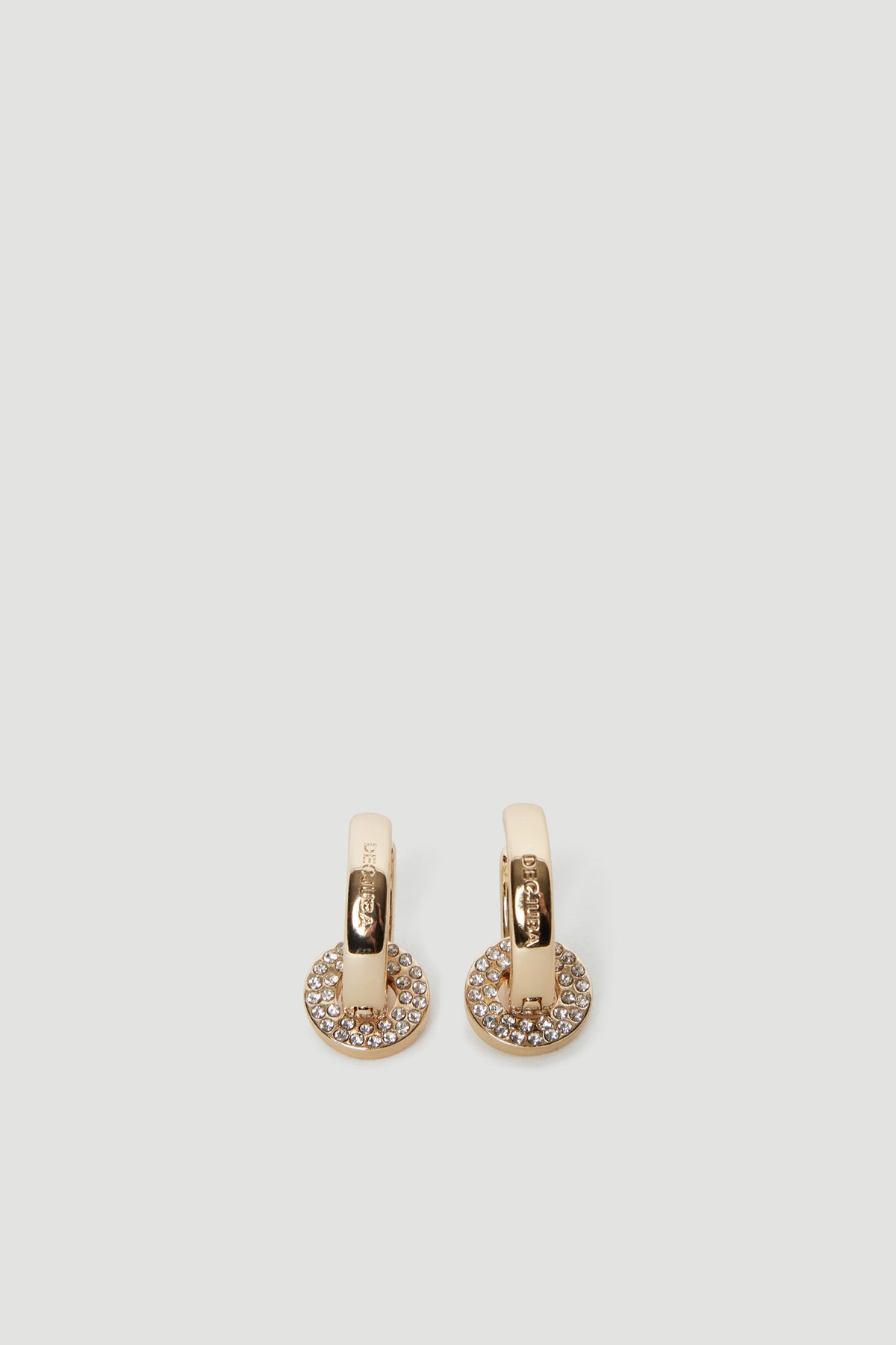 Gold-toned hoop earrings with rhinestone-encrusted circular pendants and engraved logo detail for everyday elegance