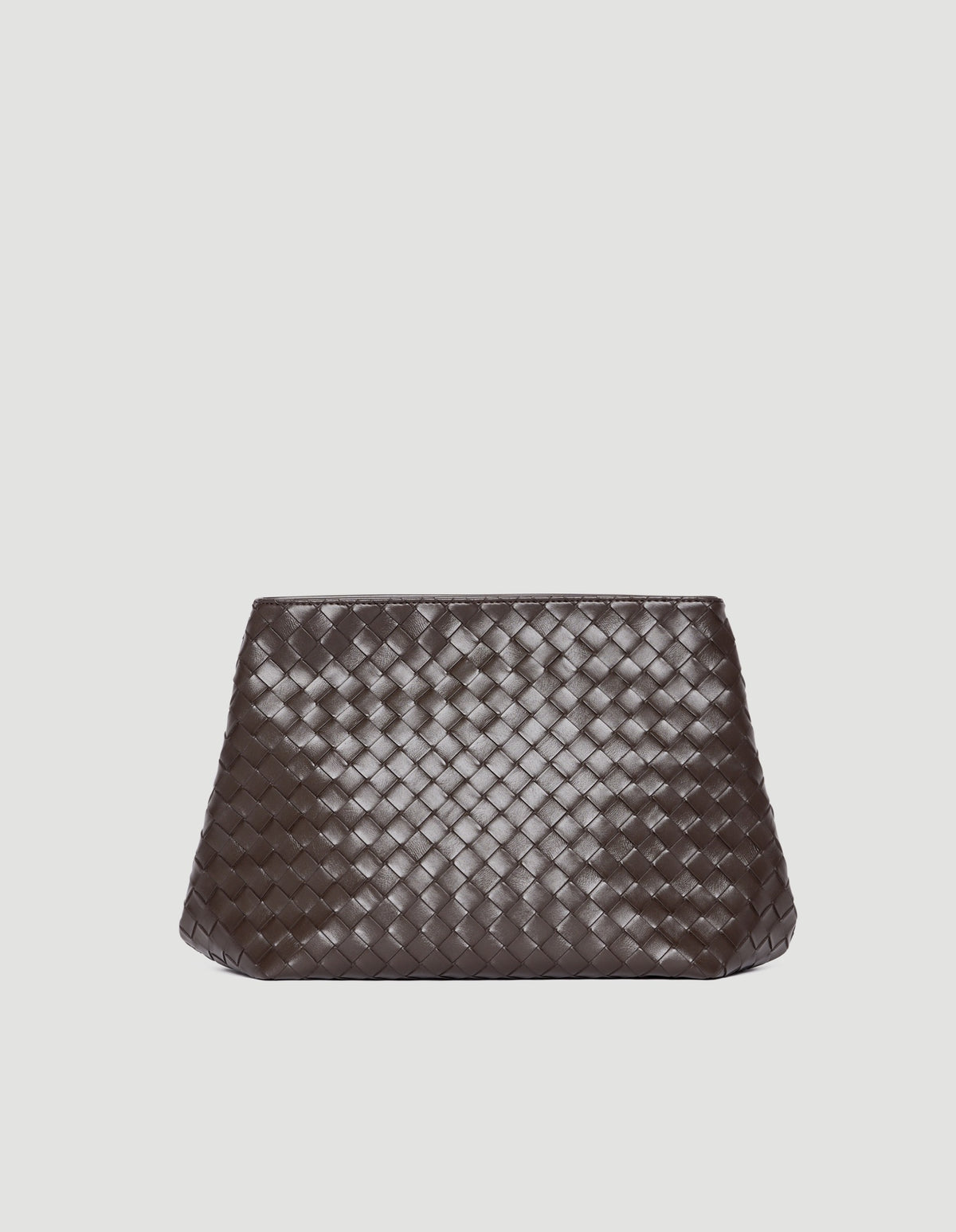 Dark chocolate brown clutch with woven texture and sleek, minimalist silhouette against a light background