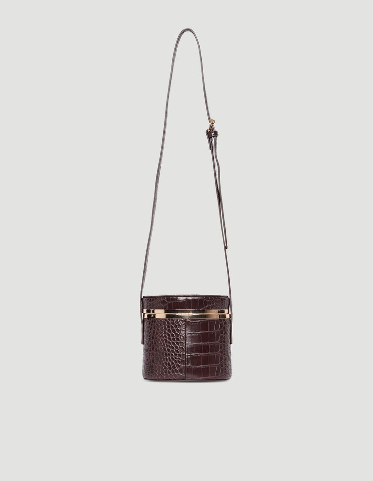 Small structured crossbody bag in textured chocolate brown with gold hardware and adjustable strap