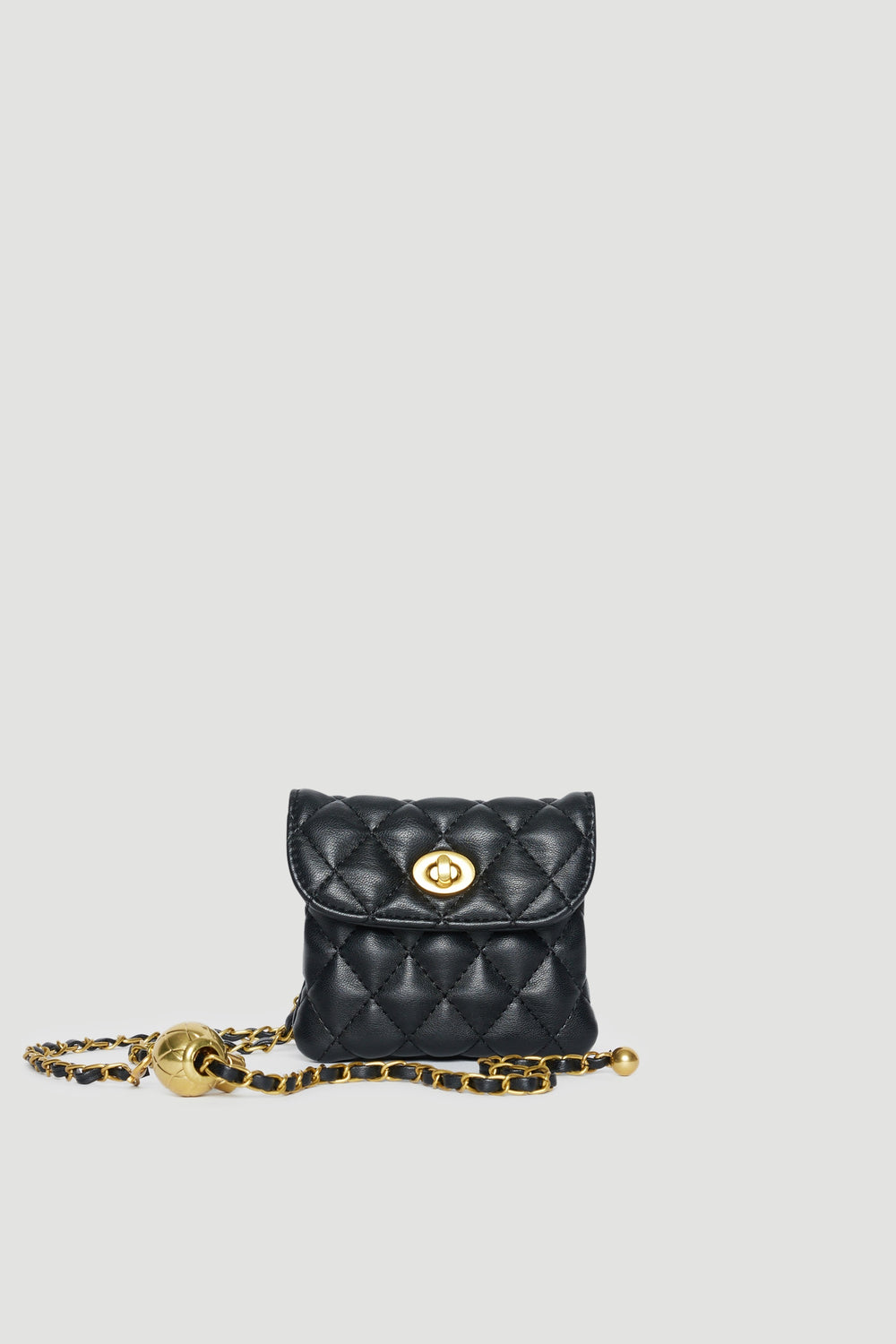 Mini black quilted crossbody bag with gold chain strap and twist lock