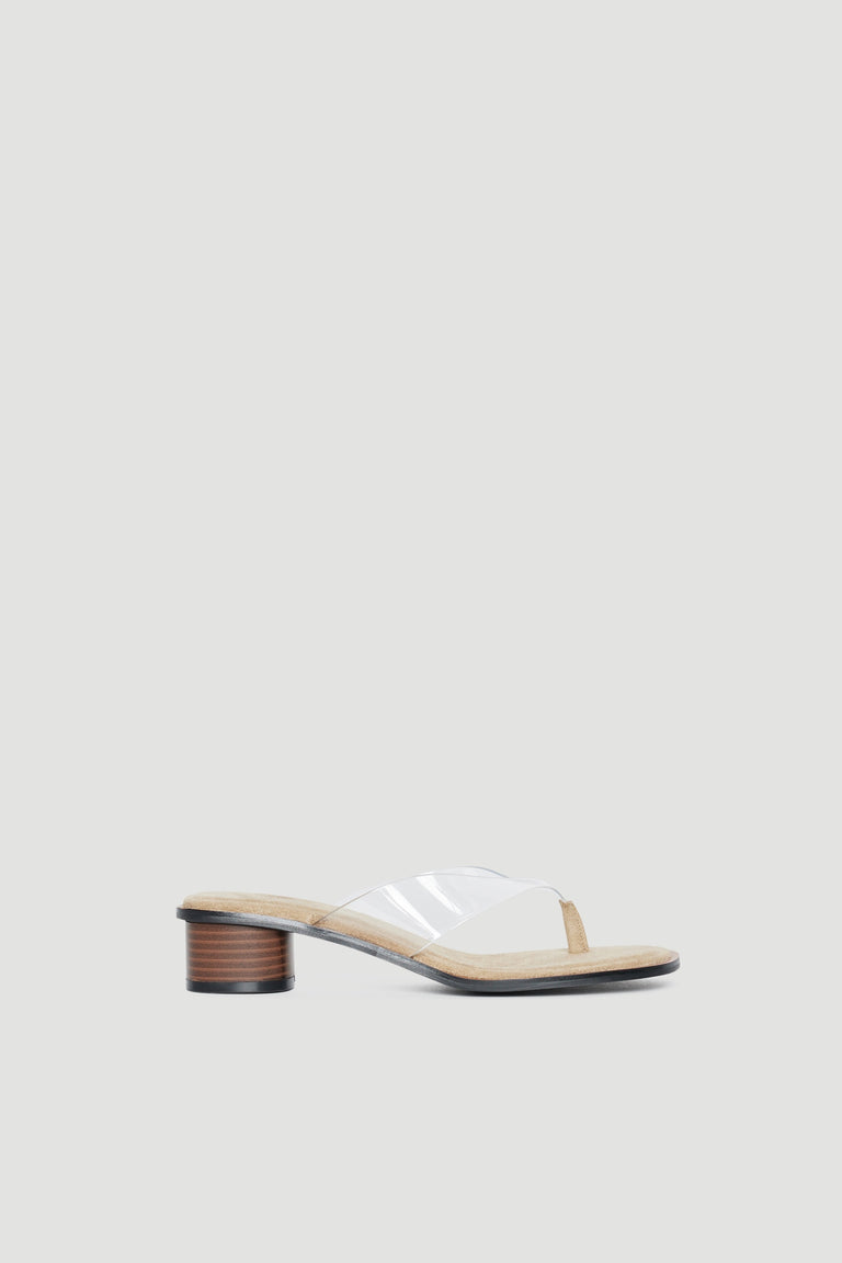 Women's sandal with a transparent strap, cream sole and medium block heel
