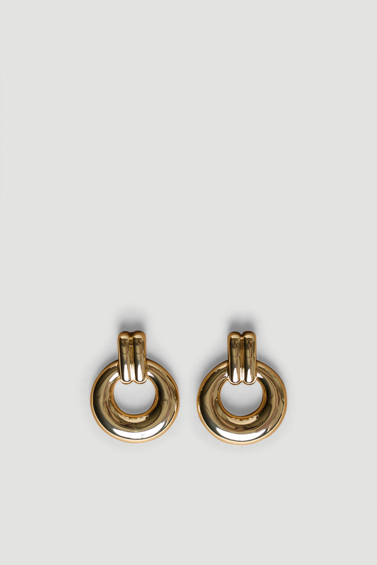 Polished gold hoop earrings with a bold door knocker design, perfect for adding effortless style to any look.