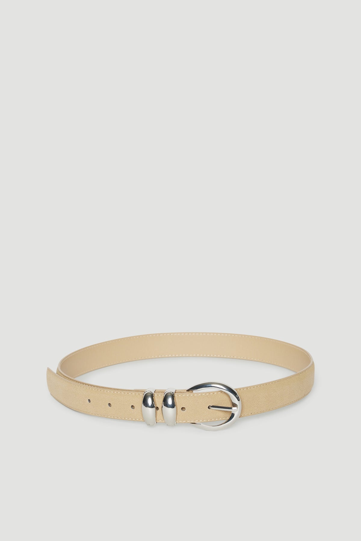 Beige faux suede belt with silver hardware and a large buckle