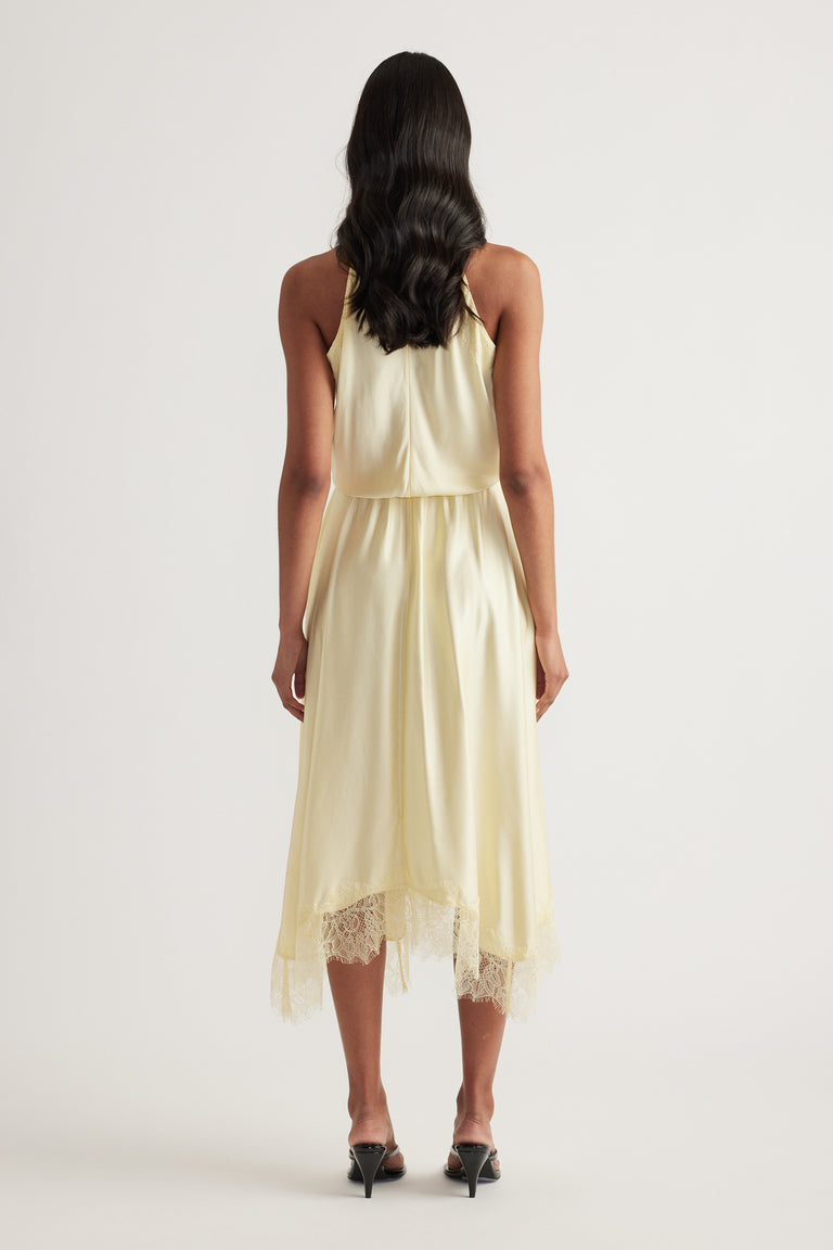 Cream halter midi dress with lace hem, shown from the back