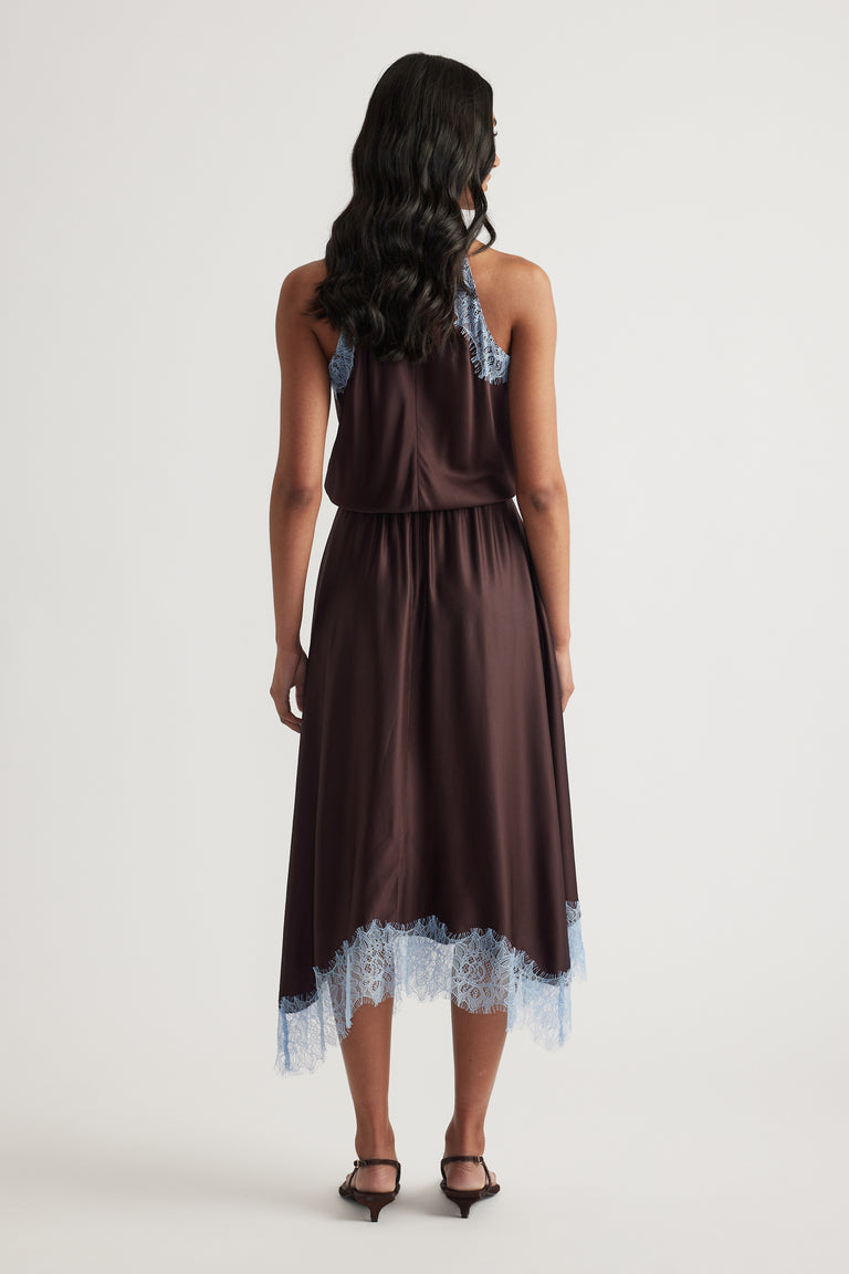 Back view of a woman wearing a chocolate brown halter midi dress with lace trim and black heels