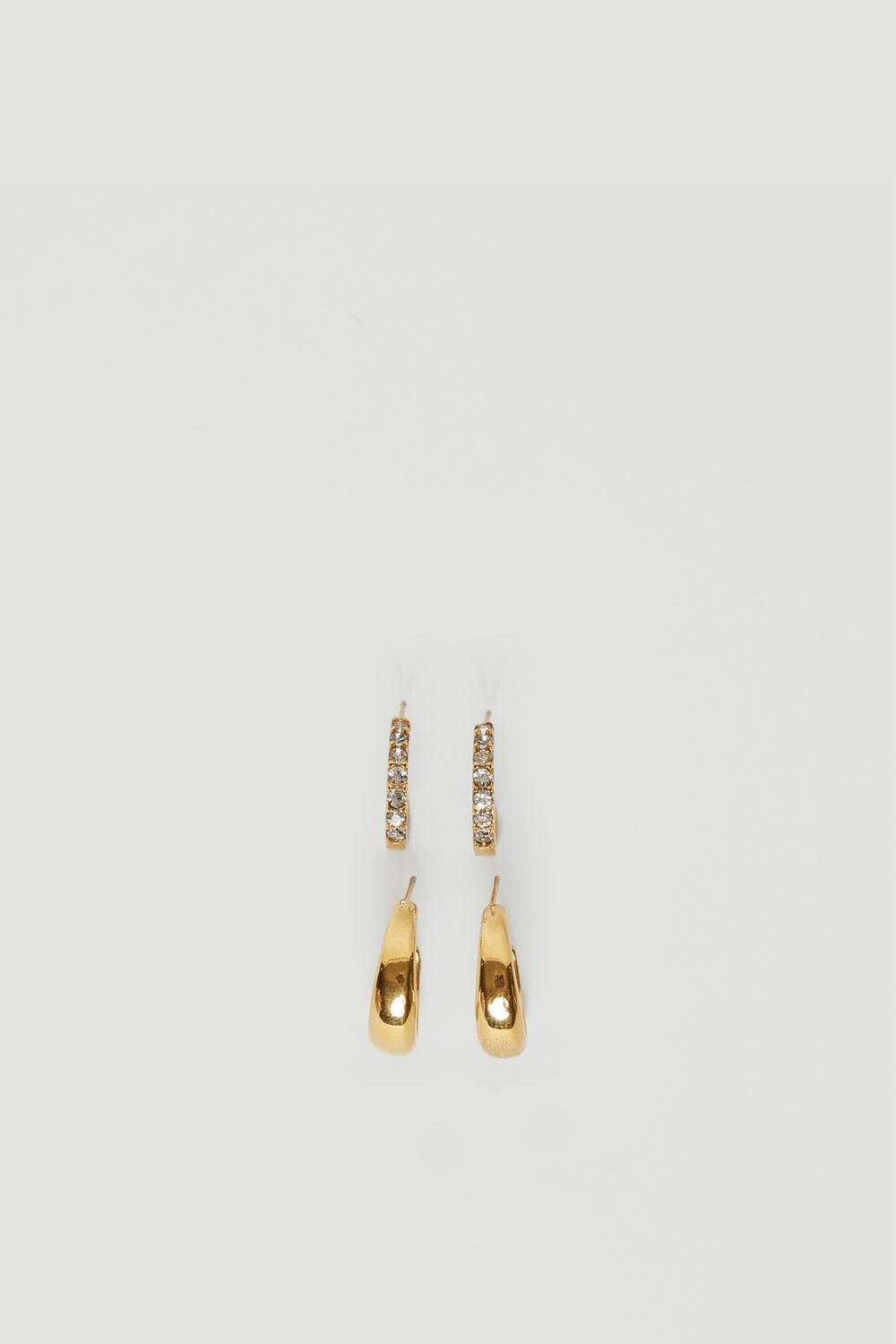 Pair of 18ct gold plated waterproof hoop earrings with elongated drop charms and textured detailing