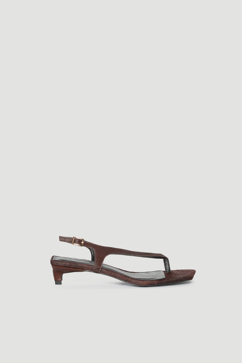 Brown leather sandal with an adjustable ankle strap, square toe and low kitten heel