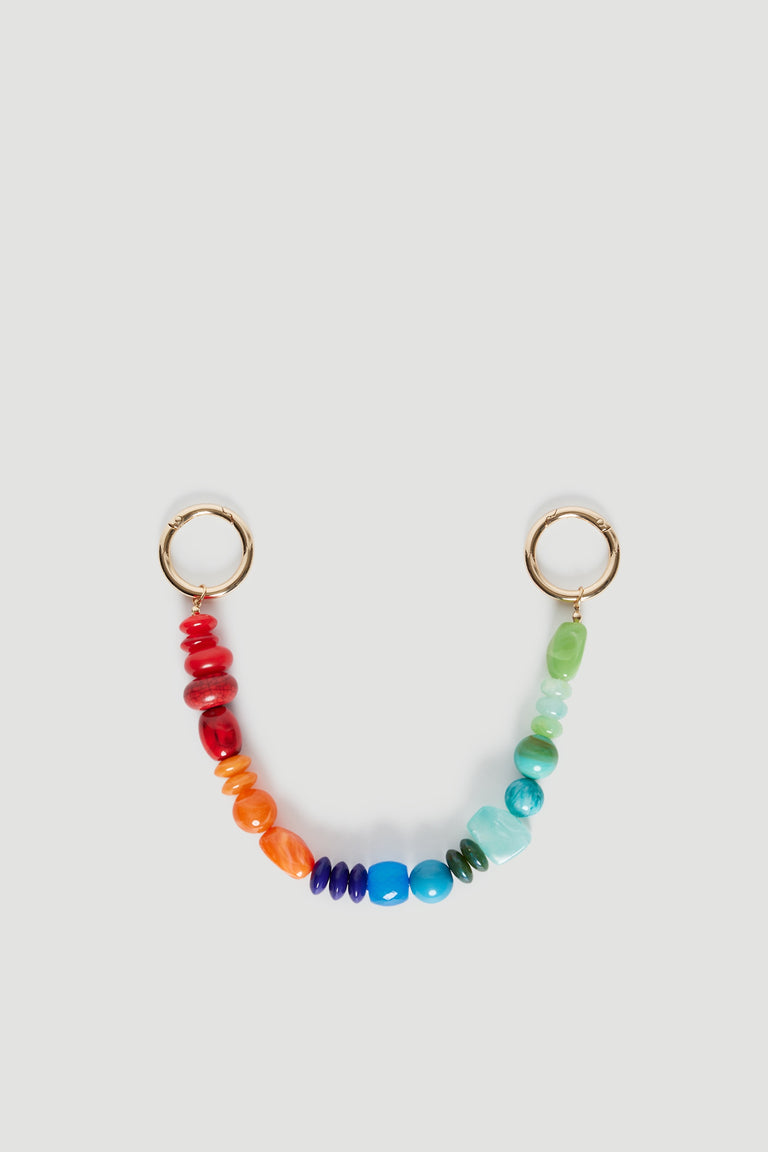 Colourful beaded bag charm with red, orange, blue and green beads and gold ring attachments